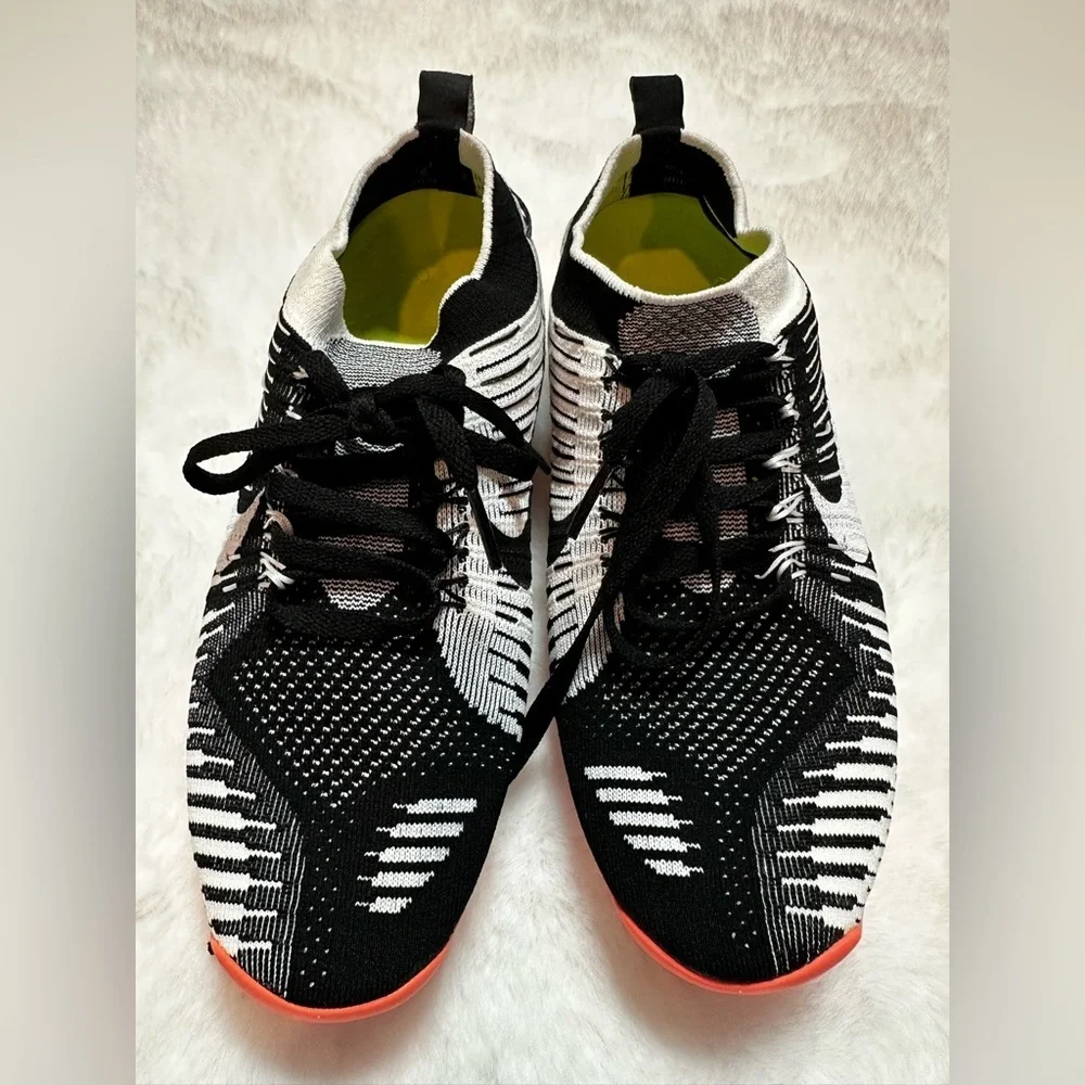 Nike Black and White Knit Sneakers with Red Soles